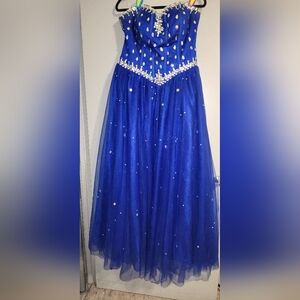 Only worn once! Like new Royal blue, beautiful ballgown.Covered in rhinestones.